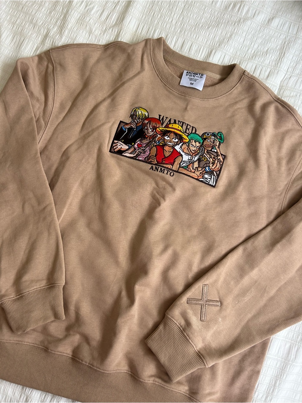Animāto Clothing One Piece Sweater